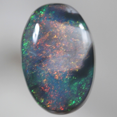 SOLID BLACK OPAL Unusual pattern, burning red bordered by black opal and sparkling green